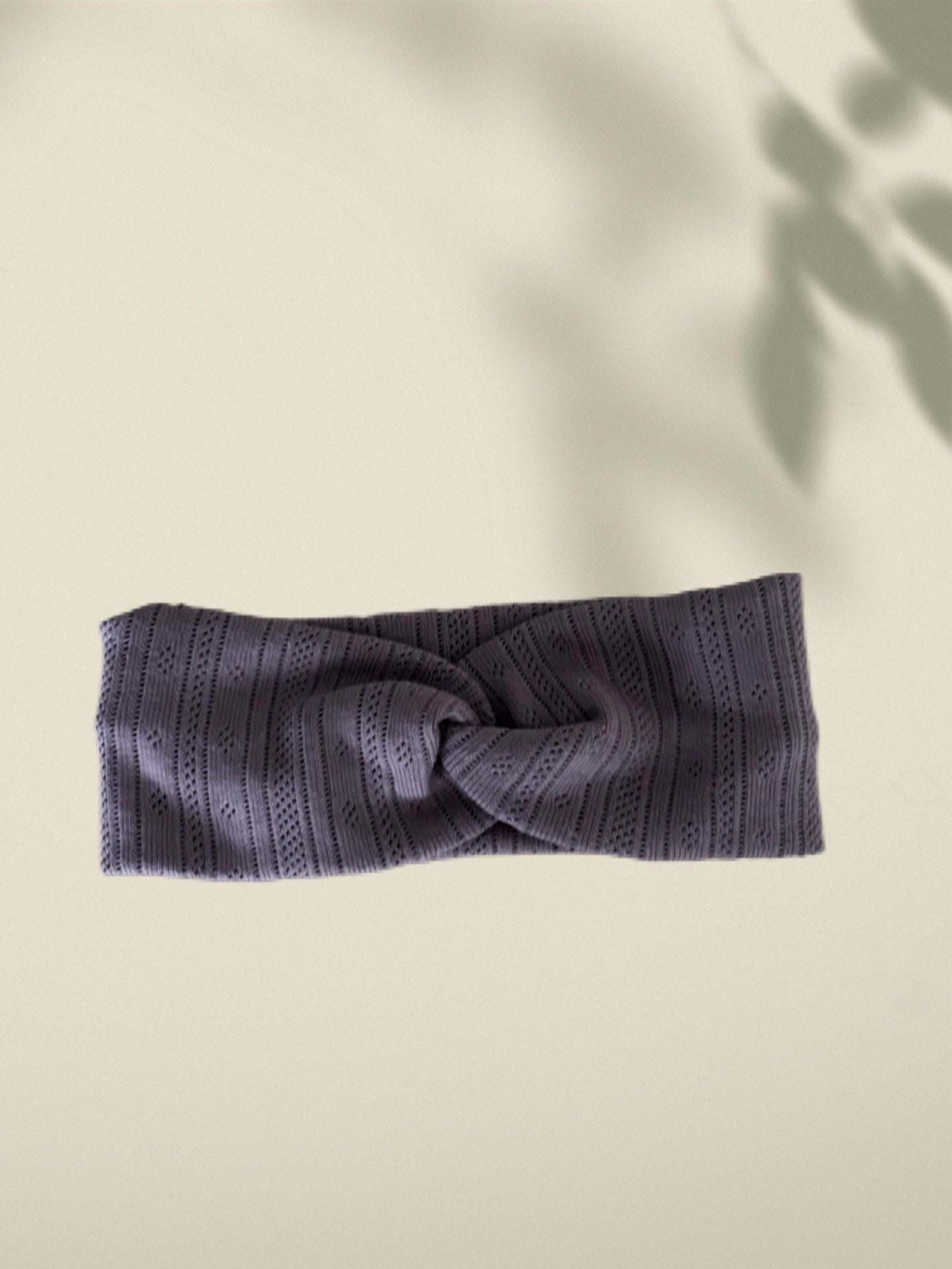 Stirnband mauve mit Lochmuster