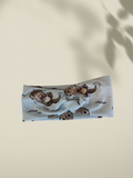 Knotenstirnband kleiner Otter